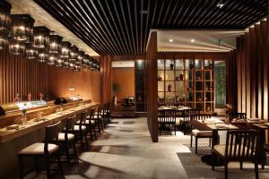 Restoran või mõni muu söögikoht majutusasutuses Shenzhen Dameisha Kingkey Palace Hotel