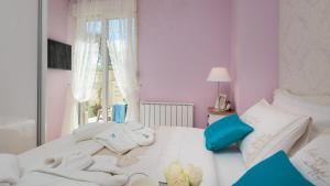Posteľ alebo postele v izbe v ubytovaní Luxury apartment Loreta
