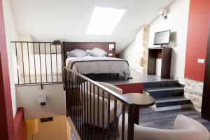 A bed or beds in a room at Apartamentos Sol de Mayo