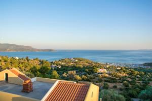 a view of the ocean from a house at Saint Catherine Hotel in Pythagoreio