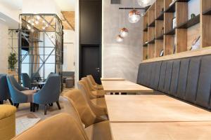 Posezení v ubytování Capital Hotel Garni