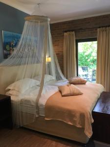 Ένα ή περισσότερα κρεβάτια σε δωμάτιο στο Montrose Guesthouse +69 φωτογραφίες