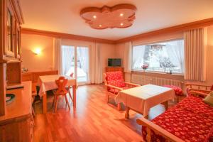 TV a/nebo společenská místnost v ubytování Apartments- und Ferienhaus Anton