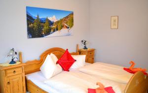 Letto o letti in una camera di Pension Gruber