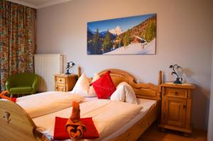 Letto o letti in una camera di Pension Gruber