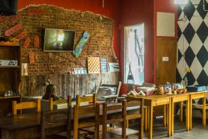 TV a/nebo společenská místnost v ubytování Hostel Casagrande