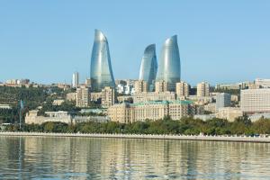 a view of the city of moscow from the water at Fairmont Baku, Flame Towers in Baku