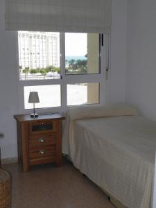 Voodi või voodid majutusasutuse BEFERENT Bulevar Playa San Juan toas