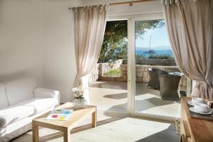 Posezení v ubytování Gabbiano Azzurro Hotel & Suites