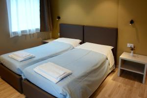 A bed or beds in a room at Casa Baldelli