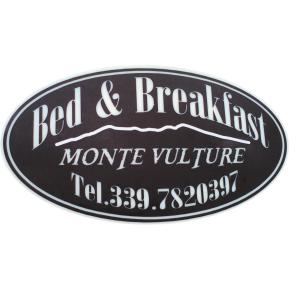 リオネーロ・イン・ヴルトゥレにあるB&B Monte Vultureのベッド&ブレックファーストの安置所の家具の看板