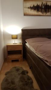 A bed or beds in a room at Ferienwohnung Kohlhofen
