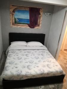 A bed or beds in a room at Maria T.