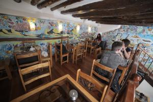 Um restaurante ou outro lugar para comer em Posada Villa Mayor