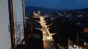 a view of a city street at night at Hotel El Eden 6 personas 4 in Zacatlán