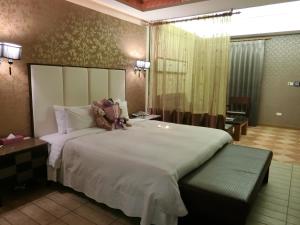 Letto o letti in una camera di Mambo Impression Motel