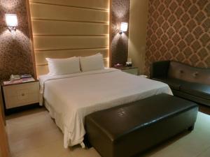 Letto o letti in una camera di Mambo Impression Motel