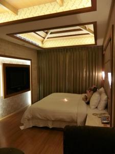 Letto o letti in una camera di Mambo Impression Motel