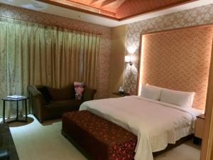 Letto o letti in una camera di Mambo Impression Motel