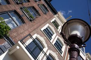 Bygningen som lejligheden ligger i + 6 billeder