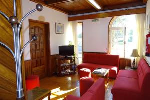 TV a/nebo společenská místnost v ubytování Hotel Mira Rio