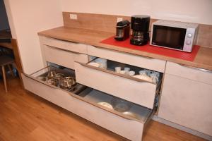 A kitchen or kitchenette at Haus Hubertus