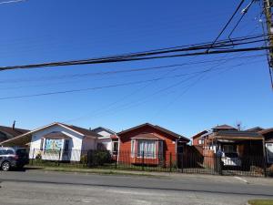 a row of houses in a residential neighborhood at Casa Jardines del Mar, Puerto Montt in Puerto Montt