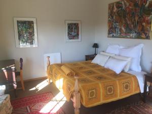 Ένα ή περισσότερα κρεβάτια σε δωμάτιο στο Amakhala