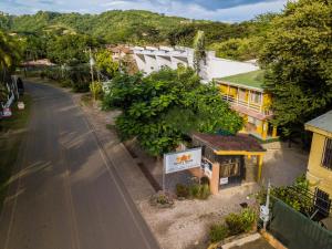 an overhead view of a street in a town at Hotel Laura's House in Coco