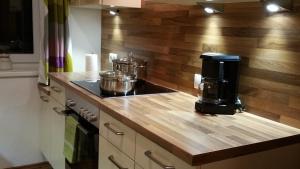 a kitchen counter with two pots and a coffee maker at Ferienwohnungen Maurer in Umhausen