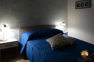 Letto o letti in una camera di La Chianarella