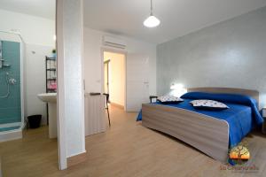 Letto o letti in una camera di La Chianarella
