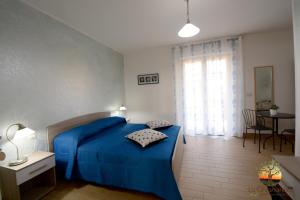 Letto o letti in una camera di La Chianarella
