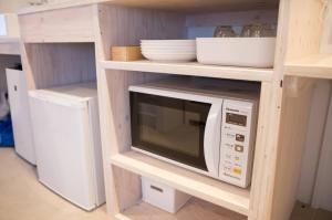Kuchyň nebo kuchyňský kout v ubytování Horikawa Hostel