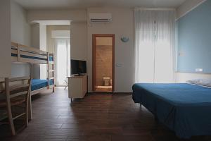 Postel nebo postele na pokoji v ubytování Hotel Sayonara