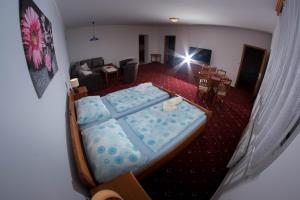 an aerial view of a bedroom with two beds at ČS RoBiN OIL Harrachov in Harrachov