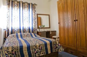 Cama o camas de una habitación en Victoria Hotel