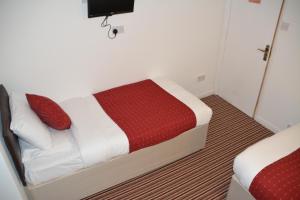 Postel nebo postele na pokoji v ubytování Bow Guest House