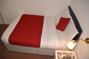 Postel nebo postele na pokoji v ubytování Bow Guest House