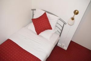 Postel nebo postele na pokoji v ubytování Bow Guest House