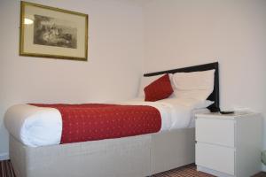 Postel nebo postele na pokoji v ubytování Bow Guest House