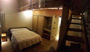 Postel nebo postele na pokoji v ubytování Hotel Dufour