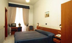 Ліжко або ліжка в номері Hotel Demetra Capitolina