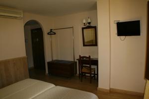 Posteľ alebo postele v izbe v ubytovaní Hotel Rural Huerta del Laurel