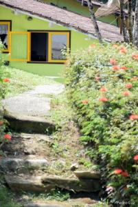 Um jardim em Pousada Bela Vista