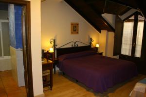 Posteľ alebo postele v izbe v ubytovaní Hotel Rural Huerta del Laurel