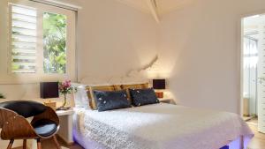 Cama ou camas em um quarto em The Chili Beach Private Resort