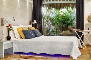 Cama ou camas em um quarto em The Chili Beach Private Resort