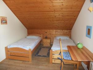 En eller flere senger på et rom på Dümpelhof Ferienwohnungen