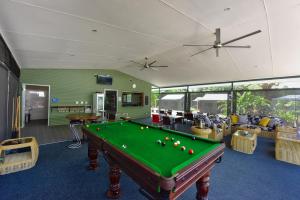 a billiard room with a pool table in it at Daintree Peaks ECO Stays in Daintree